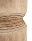 Timma Wooden Stool handcrafted from solid paulownia wood, featuring a sculptural design and natural wood grain, perfect for modern interiors