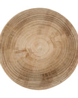 Timma Wooden Stool handcrafted from solid paulownia wood, featuring a sculptural design and natural wood grain, perfect for modern interiors