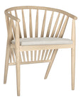 Lightwood spindle dining chair with a curved backrest and white upholstered seat, showcasing a modern yet timeless design. Crafted from solid wood, this chair brings a refined, natural aesthetic to any dining or living space