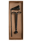 A sleek black iron candle care set featuring a wick trimmer and a candle snuffer, designed for maintaining and extinguishing candles with ease and elegance