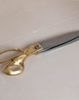 A pair of vintage-style tailor shears with brass handles and stainless steel blades, measuring 26cm in length, elegantly presented in a brown gift box