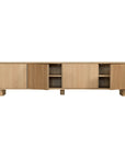 Bajo Entertainment Unit in natural oak with four flat-panel doors and a low-profile design.