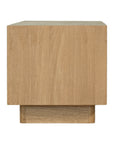 Bajo Entertainment Unit in natural oak with four flat-panel doors and a low-profile design.