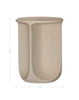Berber side table in driftstone finish featuring sculptural curved legs and a softly rounded top with a textured natural surface.
