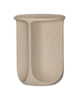 Berber side table in driftstone finish featuring sculptural curved legs and a softly rounded top with a textured natural surface.