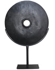 Black carved teak disc sculptures with stand in modern minimalist design, perfect for adding bold decorative accents to any interior space