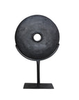 Black carved teak disc sculptures with stand in modern minimalist design, perfect for adding bold decorative accents to any interior space