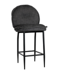 A black metal bar stool with a cushioned seat and backrest upholstered in dark linen fabric. Featuring a sleek yet relaxed design, this stool blends comfort with modern sophistication, ideal for contemporary kitchens or bar spaces