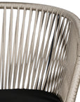 Black and natural outdoor dining chair featuring a woven rope backrest and sleek metal legs, designed for modern alfresco dining and stylish patio settings