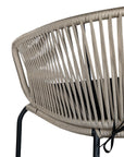 Black and natural outdoor dining chair featuring a woven rope backrest and sleek metal legs, designed for modern alfresco dining and stylish patio settings