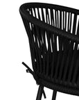 Black outdoor bar chair featuring a woven rope backrest and sleek metal legs, designed for modern alfresco dining and stylish patio settings