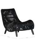 A sculptural black rattan lounge chair with a curved, low-profile silhouette and sleek wooden legs. The woven design adds texture, while the deep seat and ergonomic shape offer comfort and relaxation