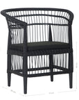 A stylish black rattan dining chair with an intricate woven design and a sleek black cushion, adding a modern touch to any dining or seating area