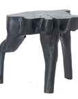 Handcrafted black wood root stool with an organic sculptural design, adding a bold and natural statement to any space