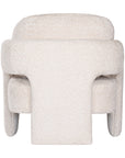 Ivory boucle armchair with rounded, sculptural design, adding modern luxury and comfort to any lounge or living space