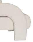 Ivory boucle armchair with rounded, sculptural design, adding modern luxury and comfort to any lounge or living space