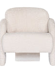 Ivory boucle armchair with rounded, sculptural design, adding modern luxury and comfort to any lounge or living space