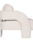 Ivory boucle armchair with rounded, sculptural design, adding modern luxury and comfort to any lounge or living space