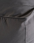 Charcoal lounge bean bag for outdoor relaxation, featuring durable fabric and ergonomic shape. Ideal for poolside lounging, garden seating, or creating a casual chill-out area.