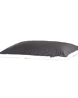 Charcoal bean bag outdoor pillow with soft fabric, perfect for casual lounging and relaxed living spaces.