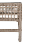 Coastal rattan coffee table with a natural woven frame and resin top, perfect for creating a relaxed, airy living space