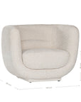 A modern curved armchair upholstered in soft ivory bouclé fabric from KULALA Living. Designed for comfort and style, this contemporary accent chair adds elegance to any living space