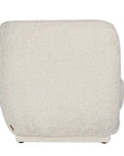 A modern curved armchair upholstered in soft ivory bouclé fabric from KULALA Living. Designed for comfort and style, this contemporary accent chair adds elegance to any living space