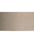A neutral-toned linen wall light shade with a minimalist curved design. This sophisticated fabric shade brings a soft, warm ambiance to any space, perfect for modern and natural-inspired interiors.