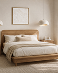 Flynn Oak Bed by KULALA Living shown in natural wood finish, featuring a sturdy frame and clean design for modern bedroom decor.