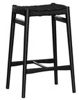 The Kulala Living Handwoven Counter Stool in black features a meticulously woven seat crafted from durable fibre, supported by a solid timber frame with a sleek black finish. This modern yet timeless piece adds texture and sophistication to kitchen and bar spaces.