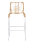 A stylish bar stool featuring a handwoven natural rattan seat and a sleek white metal frame. Designed for modern coastal and contemporary spaces, this lightweight yet sturdy stool adds texture and warmth to kitchen and bar areas