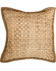 Handwoven water hyacinth cushion with natural texture and braided edging, perfect for adding organic warmth to any living space