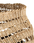 A unique handwoven rattan decorative basket with an open-weave design and a dark wooden base. A statement piece that adds texture and organic warmth to any interior