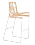 A stylish bar stool featuring a handwoven natural rattan seat and a sleek white metal frame. Designed for modern coastal and contemporary spaces, this lightweight yet sturdy stool adds texture and warmth to kitchen and bar areas