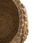 Handwoven seagrass basket with organic textured detailing, featuring natural tones and intricate weaving, ideal for contemporary home decor