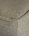 A versatile moss modular ottoman with soft linen upholstery, designed for effortless comfort and modern living. Perfect as a standalone piece or paired with matching modular seating