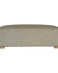A versatile moss modular ottoman with soft linen upholstery, designed for effortless comfort and modern living. Perfect as a standalone piece or paired with matching modular seating