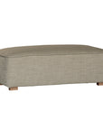 A versatile moss modular ottoman with soft linen upholstery, designed for effortless comfort and modern living. Perfect as a standalone piece or paired with matching modular seating