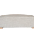 A versatile wheat modular ottoman with soft linen upholstery, designed for effortless comfort and modern living. Perfect as a standalone piece or paired with matching modular seating