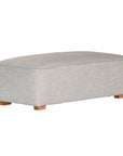 A versatile moss modular ottoman with soft linen upholstery, designed for effortless comfort and modern living. Perfect as a standalone piece or paired with matching modular seating