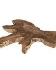 Koro serving board in teak featuring natural edge detail and rich organic wood grain.