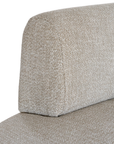 Laguna modular sofa in oat drift fabric with curved form and soft cushions on a clean background.