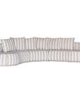 Laguna modular sofa in sand stripe fabric with curved form and soft cushions on a clean background.