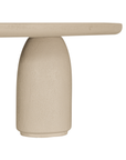 Lantara coffee table in driftstone finish with sculptural pedestal base and soft rounded top.