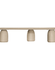 Lantara coffee table in driftstone finish with sculptural pedestal base and soft rounded top.
