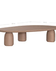 Lantara coffee table large in nomad dune finish with elongated oval top and three rounded sculptural legs.