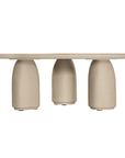 Lantara coffee table in driftstone finish with sculptural pedestal base and soft rounded top.