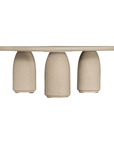Lantara coffee table in driftstone finish with sculptural pedestal base and soft rounded top.