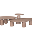 Lantara coffee table small in nomad dune finish with rounded top and three sculptural cylindrical legs.
