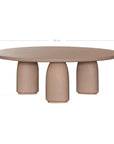 Lantara coffee table small in nomad dune finish with rounded top and three sculptural cylindrical legs.